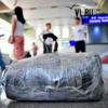 Минтранс предложил не считать дамские сумки и портфели ручной кладью в самолете