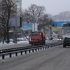 Снегоуборщики с поднятыми ковшами промчались в сторону центра — newsvl.ru