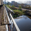 Река под железнодорожным мостом — newsvl.ru