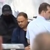 Главу Владивостока ведут на допрос. Фото НТВ — newsvl.ru