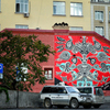 Стену здания у кинотеатра разукрасил в 2012 году известный канадский художник Карлито Дальседжио — newsvl.ru