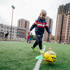 Юные футболисты учатся обходить конусы с мячом  — newsvl.ru