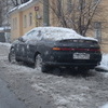 За ночь снег облепил машины — newsvl.ru
