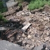 В районе Тобольской, 11 смыло бордюры и вымыло грунт из-под асфальта — newsvl.ru