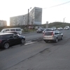 Разбитая дорога на Нейбута осложняет проезд автотранспорта (ФОТО)