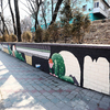 Вдоль подпорной стены на Партизанском проспекте расположилось изображение подземных приключений диггеров — newsvl.ru