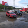 Проблема с ливневкой также является причиной убитого состояния дороги на Снеговой   — newsvl.ru