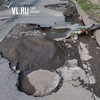 На Никифорова с дорог посмывало асфальт, а вокруг ливневок образовались ямы (ФОТО)