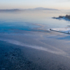Берег в снегу, море - во льду — newsvl.ru