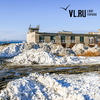 Собранный с городских улиц снег вывозят на площадку в районе улицы Леонова