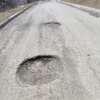 Местные жители обращают внимание на то, что дорогу здесь неизбежно разрушает отсутствие ливнёвок — newsvl.ru