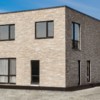 Готовый двухэтажный дом площадью 150 кв. м из домокомплектов ДСК "Приморье", проект с плоской крышей — newsvl.ru