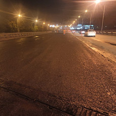 За ночь на Некрасовском путепроводе уложили 95 тонн асфальта – вечером работы продолжатся