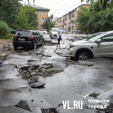 A heavy overnight downpour destroyed a street in Vladivostok that had been repaired two weeks ago.