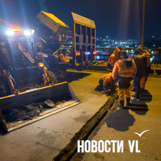 Щели на Рудневском мосту ночью заложили брусчаткой и заасфальтировали